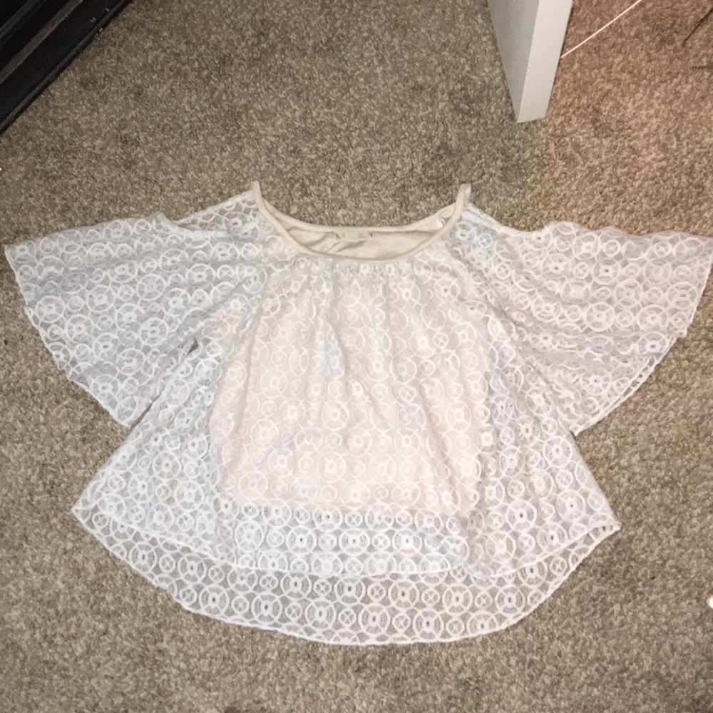 It’s on time open shoulder shirt
